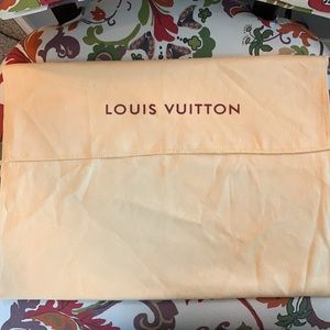 Louis Vuitton dust bag 20” wide 14” deep pocket.
